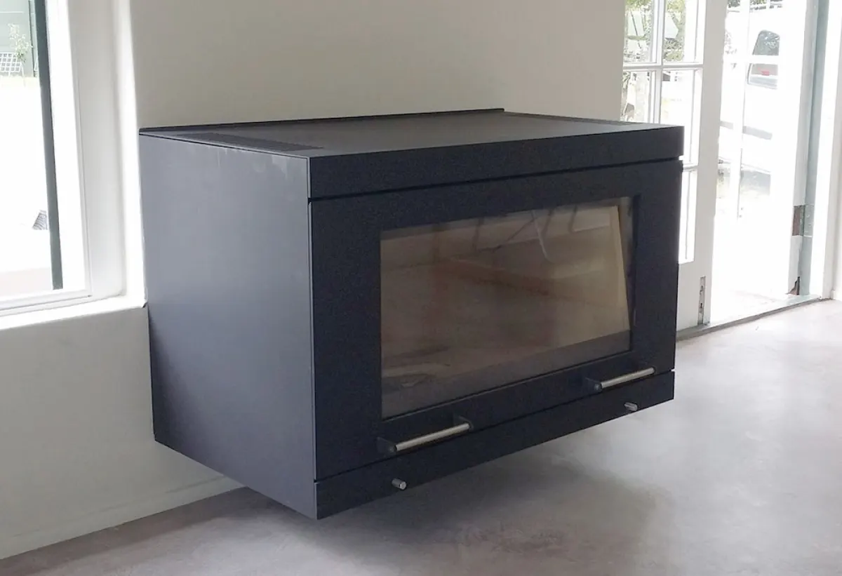 Wide double-sided built-in fireplace in an open-plan living room